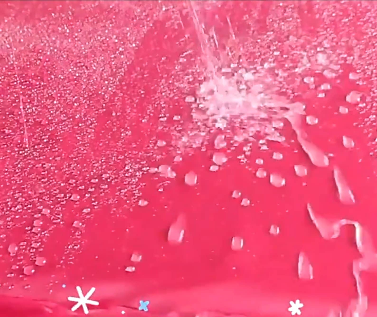 Water beading up on Oxford fabric surface showing lotus effect waterproof coating