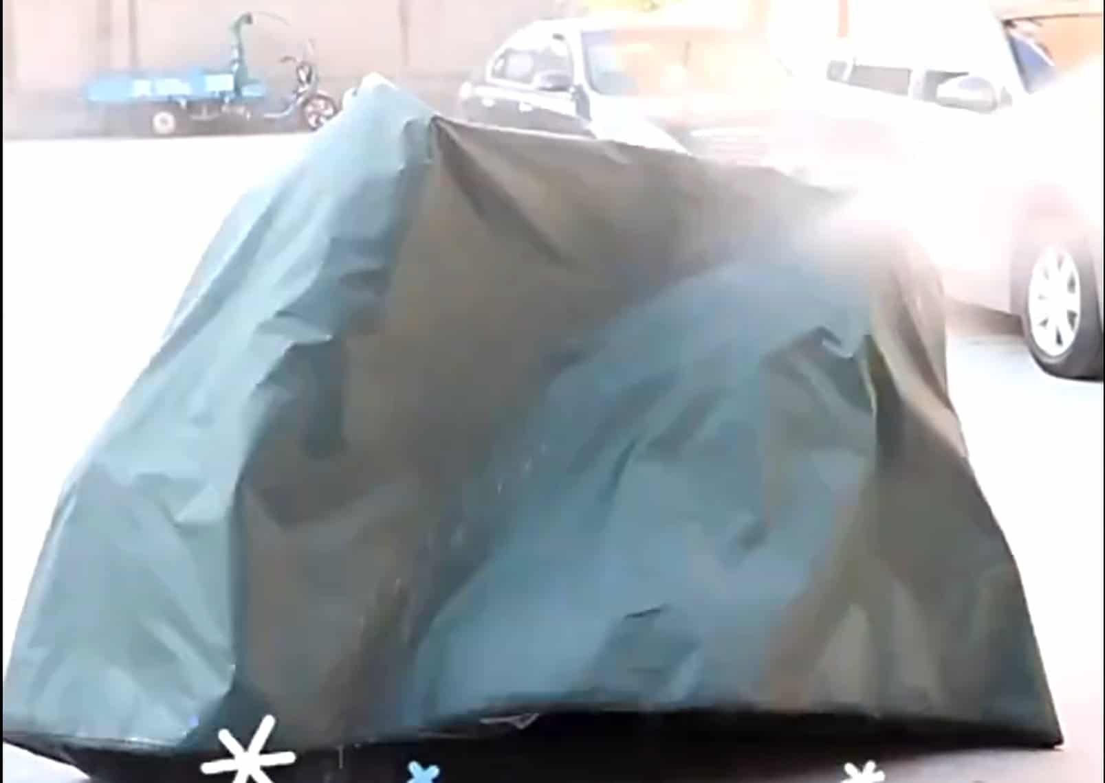 High pressure water spray test on assembled canopy fabric showing zero leakage